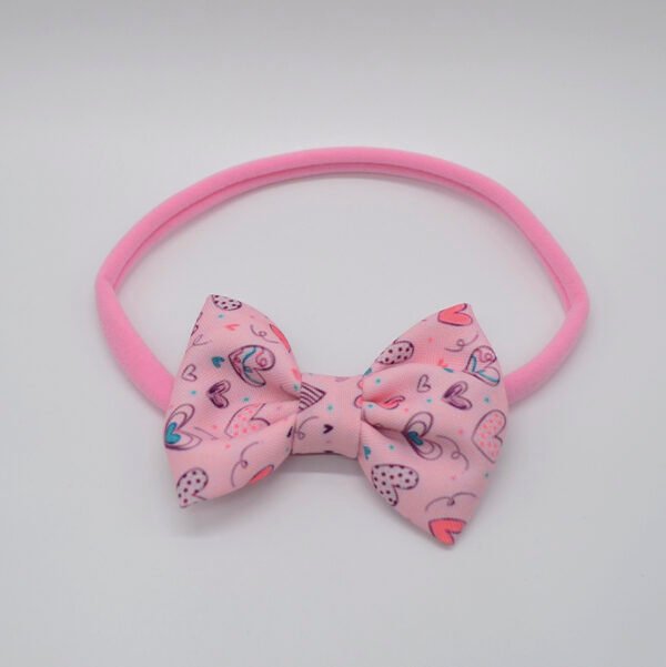Cintillo Corazones Rosados