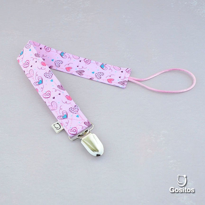 Porta Chupete Corazones Rosado